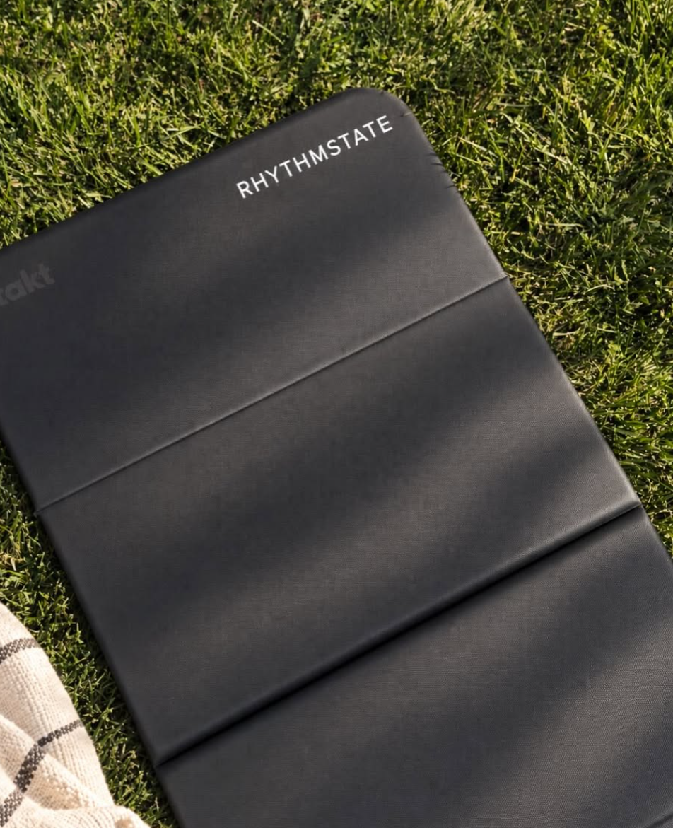 RHYTHMSTATE mat laid on the grass